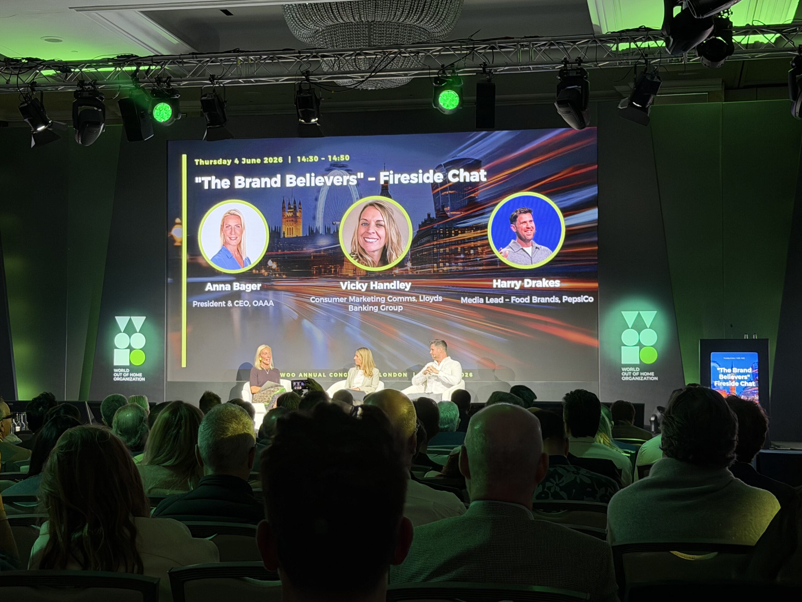 The Brand Believers" fireside chat on stage at WOO Annual Congress London 2026